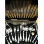 Matched set of silver plated Old English pattern cutlery in medium oak canteen