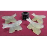 Set of four polished green hardstone chopstick rests in the form of fish, L4cm, H2cm and a