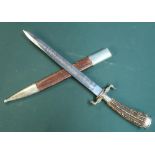 Large, quality German hunting knife. 12 inch blade, finely etched with stags and hunting trophies