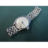 Military wristwatch with reverse broad arrow mark A.T.P 220024 - 37201 with metal bracelet