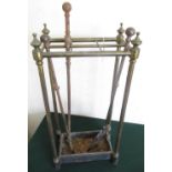 Edwardian cast iron & brass six division stick stand, H61cm W30cm D18cm, and a set of three early