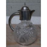 Edwardian lead crystal ewer shaped claret decanter with later silver collar and handle, Birmingham