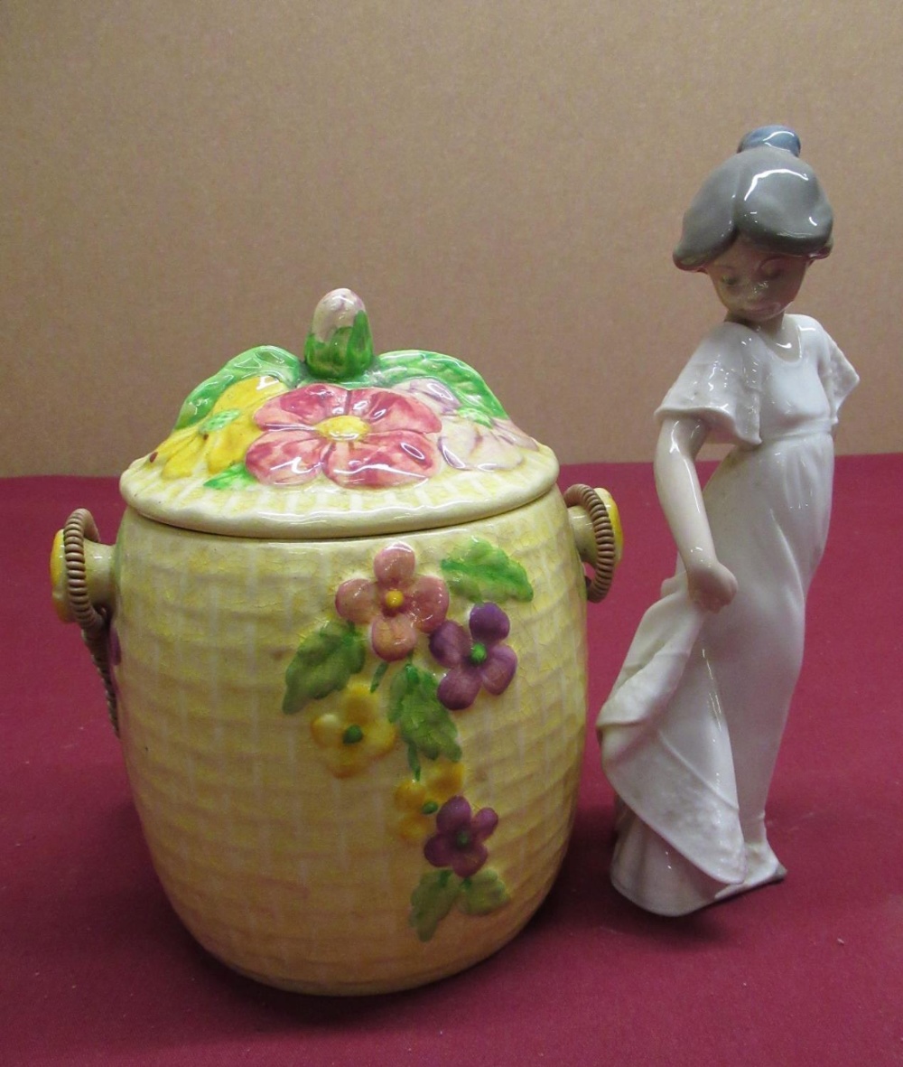 Wade Heath basket moulded biscuit barrel with floral lid and wicker bound handle, H17cm, and a Nao