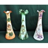 Victorian glass vases, one orange with green hand painted foliage and a portrait of young lady