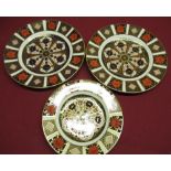 Pair of Royal Crown Derby 11 28 Imari pattern circular plates D22cm and another similar smaller