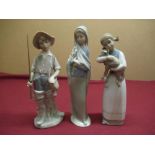 Three Lladro figures, Fisher Boy, Shepherdess, and one other (3)