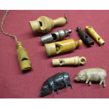 20th C plated whistle, a horn whistle, four tureen whistles and two Britains diecast painted pigs