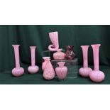 Collection of Wedgwood and Mdina trumpet shape and other pink coloured glass vases, (10)