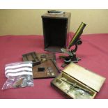 Late 19th C lacquered brass and japanned metal monocular microscope with three slides, bullseye
