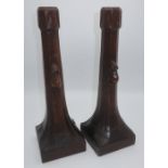 Robert Mouseman Thompson - a pair of early oak candlesticks of good colour, with triangular carved