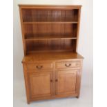 Andrew Conning Butterfly Furniture - an oak dresser with twin shelf back, the base with panelled
