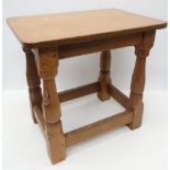 Robert Mouseman Thompson - an oak joint type stool with rectangular top on four octagonal baluster