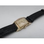 Longines mechanical wristwatch, rectangular curved 10K gold filled case, shaped lugs on leather