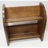 Robert Mouseman Thompson - an unusual small oak two tier book trough with adzed curved ends,