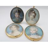 Group of four early 20th century oval portrait miniatures studies of young ladies, in Georgian