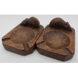 Robert Mouseman Thompson - a pair of adzed oak ashtrays, carved left and right facing, carved with