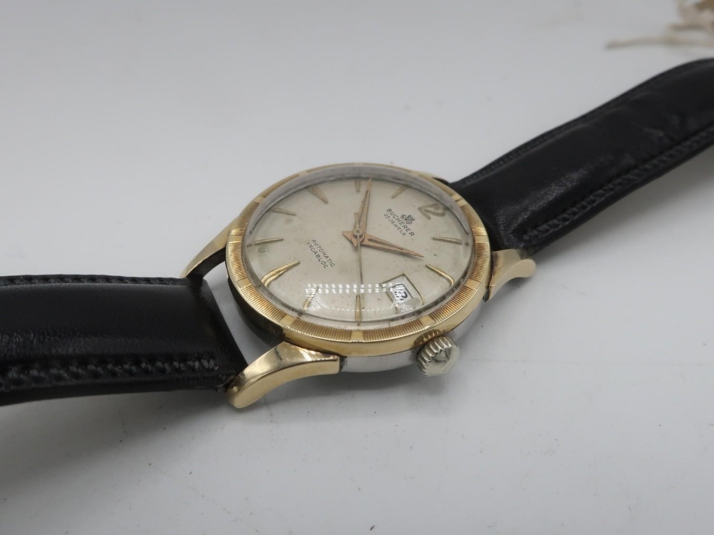 Bucherer automatic wristwatch with date, gold plated and stainless steel case on leather strap,