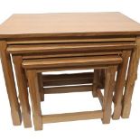 Robert Mouseman Thompson - a nest of three occasional tables, rectangular adzed tops on octagonal