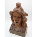 20th Century Dutch carved oak Chemists shop Gaper figure, with flowing hair and open mouth,