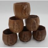 Robert Mouseman Thompson - set of six adzed oak napkin rings, carved with signature mouse, H5cm (6)