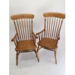 Andrew Conning Butterfly Furniture - a pair of Victorian Windsor style oak elbow chairs with stick