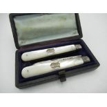 Victorian folding soft fruit knife and fork, Mother of Pearl handles with engraved cartouche, and