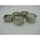 Five 20th C silver hallmarked napkin rings, variously decorated, Chester and Birmingham 1907-1970 (