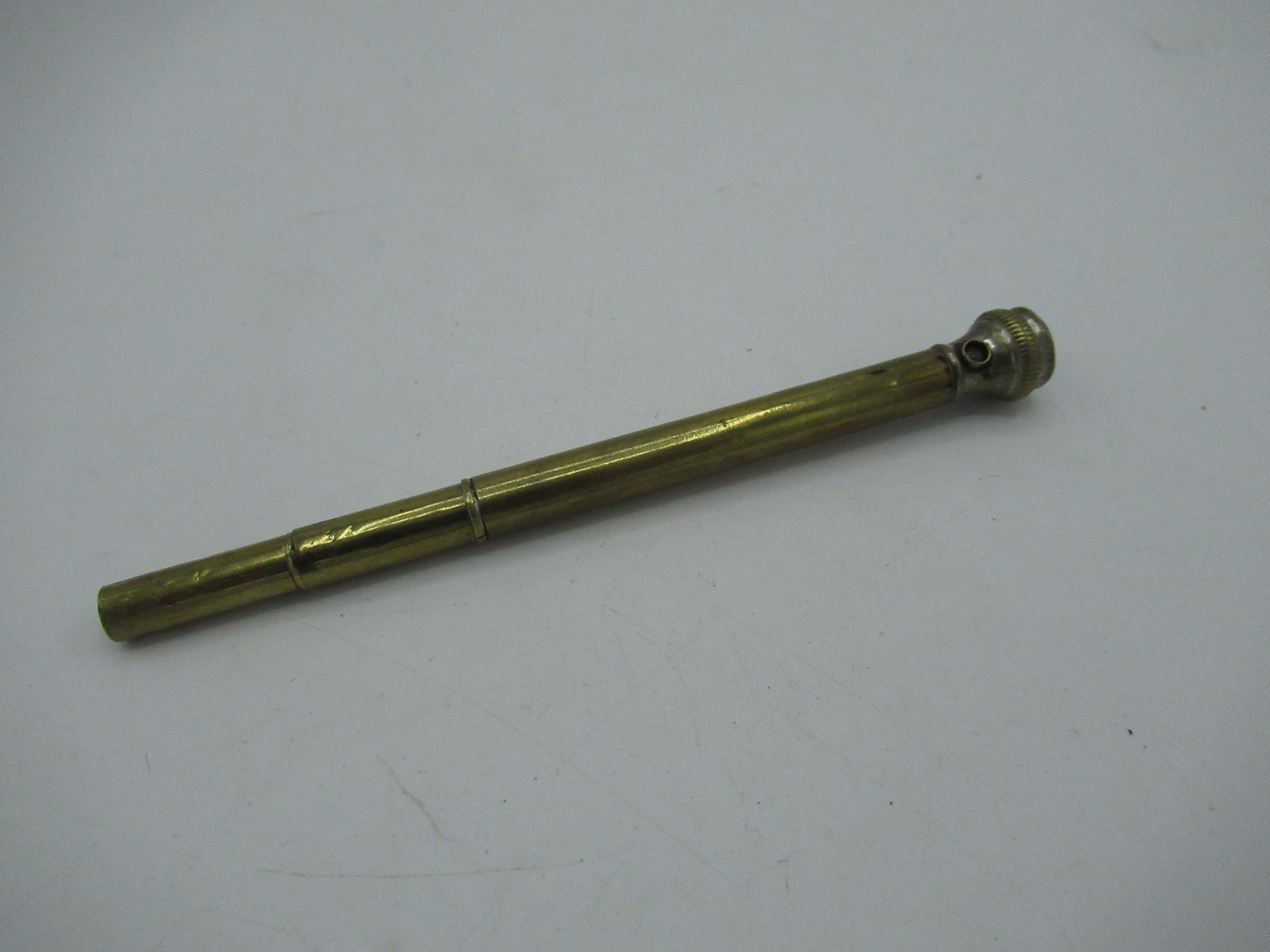 A brass propelling pencil