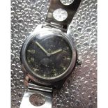 WWII 'Dirty Dozen' Cyma military issue wristwatch, stainless steel case on later rally style