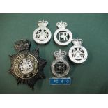 Collection of Northumberland constabulary cap badges and PC badge and a night time constabulary