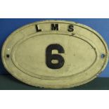 A cast iron wagon plate for LMS stamped 6