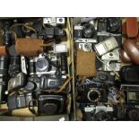 Two boxes of various camera equipment including: Praktica LTL3, Praktica BCA, Nikon lite touch zoom,