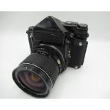 Pentax 67 medium format camera with a Pentax 55mm F4 lens and metered prism head (untested)