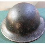 British WWII period black painted civil defence helmet with faint ARP to the front (lacking liner)