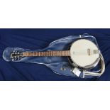 Godman guitar banjo with Remo weatherking banjo batter head, four drum tuning lugs and 22 frets in
