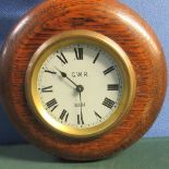 A GWR pork pie wooden cased wall clock stamped GWR 0335