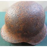 WWII period German relic state steel helmet (found in forest by metal detectors on Latvian and