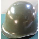 Possible reproduction of a Soviet block post WWII steel helmet with liner and straps