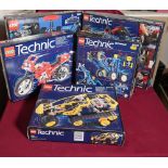 Collection of lego technic sets including: drag racer No8857, a F1 car 8440, motor bike 8422 and two