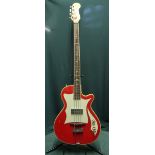 1950s electric bass guitar (possibly Dallas) with one piece body in red and white finish, a Hofner