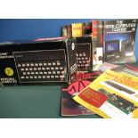 Two boxed Sinclair ZX Spectrum personal computers with a quantity of the home computer course