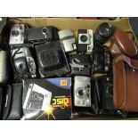 Collection of various cameras including: Canon AF7, Zenith, Pentax Espio 928m, Kodak easy share