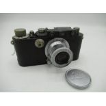 Leica IIIA black paint body with a Leitz Elmar 5cm F3.5 folding lens (slow shutter speeds do not