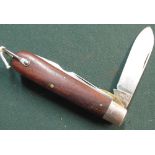 Boker USA twin bladed pocket knife with polished wood grips and lanyard ring