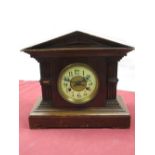 Early 20th C mantle clock medium oak architectural case, brass bezel enclosing ceramic bezel,