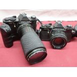 Two Pentax MV1 black bodies, a Pentax 50mm F2 lens, a Hanimex 80-200mm and a Pentax ME winder