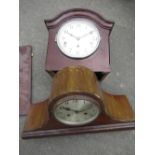 A C20th mahogany cased arched top mantel clock, with silvered Arabic dial, twin train movement