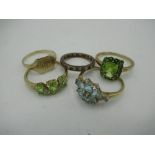 9ct gold Halo style peridot ring Size R, gross 2.8g and a 9ct gold aquamarine ring Size S gross 2.1g