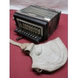 A vintage squeeze box and a vintage Stagg Gloves white leather flying helmet
