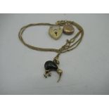 9ct gold heart padlock charm, yellow metal circular pendant and 9ct gold necklace with ibis
